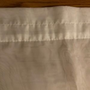 4 panels of sheer white curtains